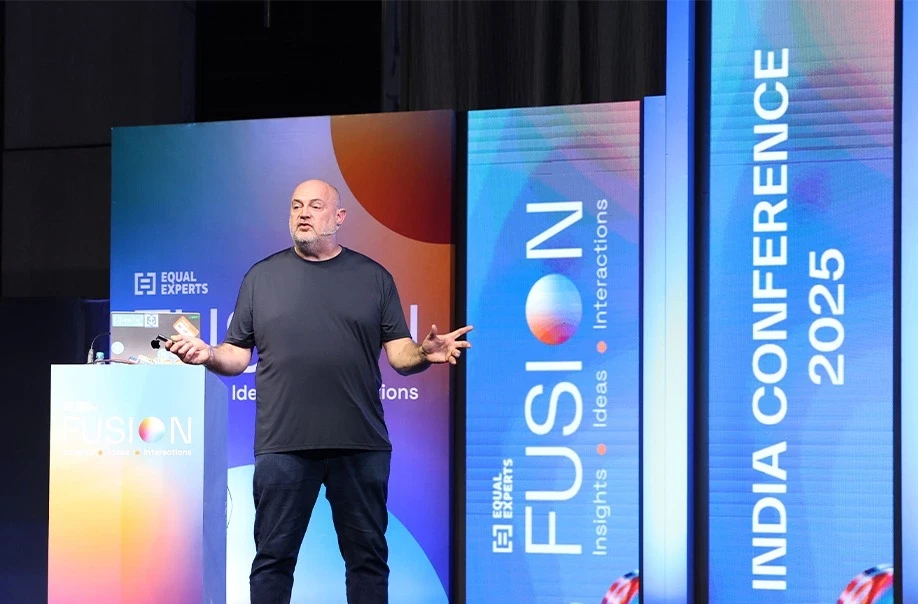 Man giving presentation at Fusion event stage