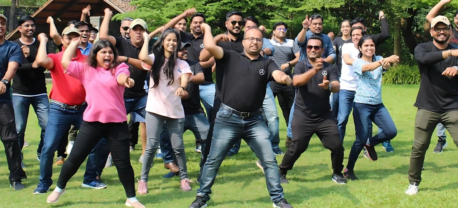 Employees enjoying fun outdoor team building activity