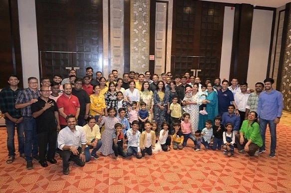 Group photo of families at a company event