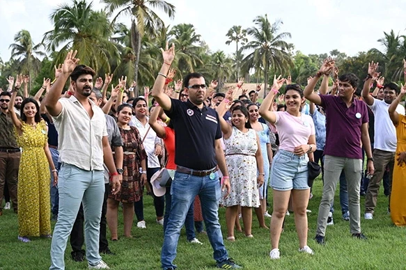 Employees participating in outdoor team activity