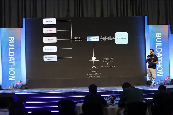 Speaker presenting hiring flow at Buildathon
